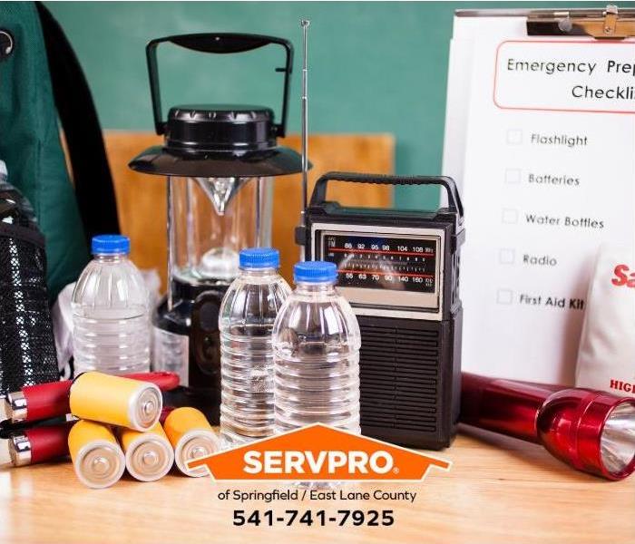 Emergency supplies sit on a counter. 