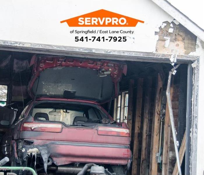 A garage is shown with fire damage.